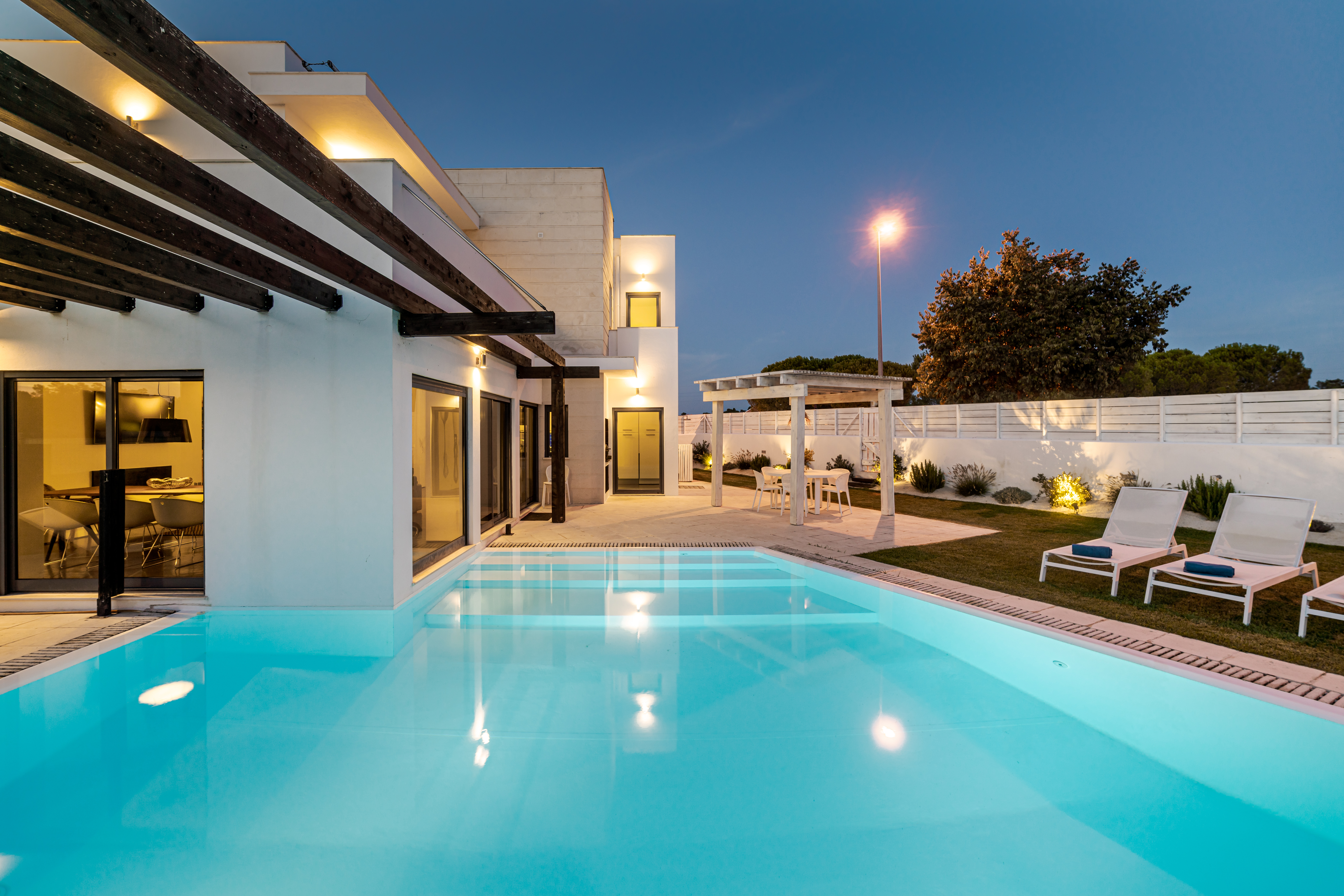 Modern villa with a swimming pool and expansive glazing